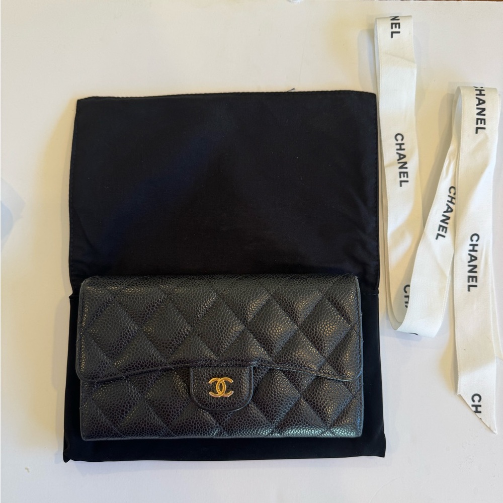 CHANEL Black Quilted Leather Clutch with Gold Logo - Picture 2 of 16